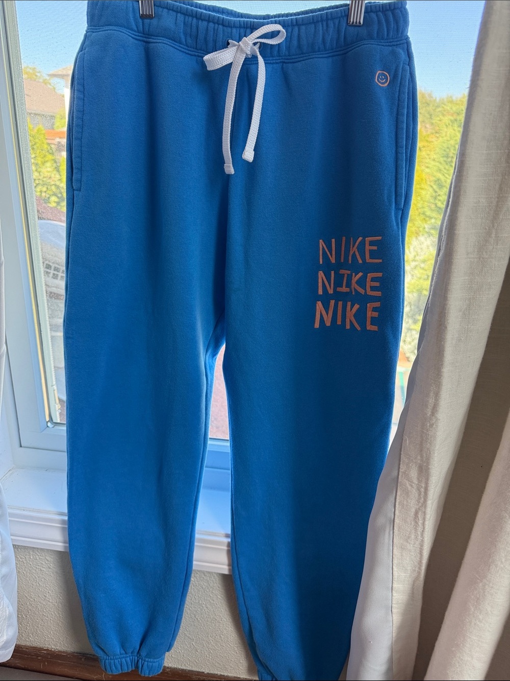 Nike Kids Blue Fleece Joggers with White Drawstring